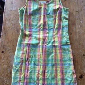 Cotten, knew length. Vintage. Slight tear in waist near buttons on side.